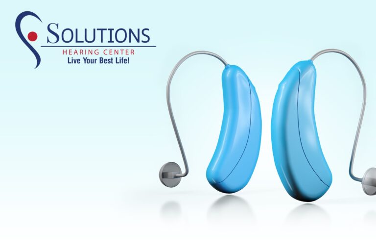 hearing aids on a blue background